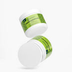 Several Greens Superfood tubs stacked at angles on a plain background
