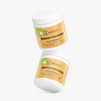 Several Energy Powder (Melon Creamsicle) tubs stacked at angles on a plain background