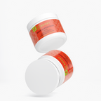 Several Reds Superfood tubs stacked at angles on a plain background
