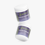 Several Focus Powder (Sour Grape) tubs stacked at angles on a plain background