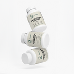 Several Ginkgo Biloba + Ginseng bottles stacked at angles on a plain background