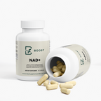 NAD+ bottle tipped open with the capsules spilling out