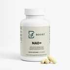NAD+ bottle with a few capsules beside it