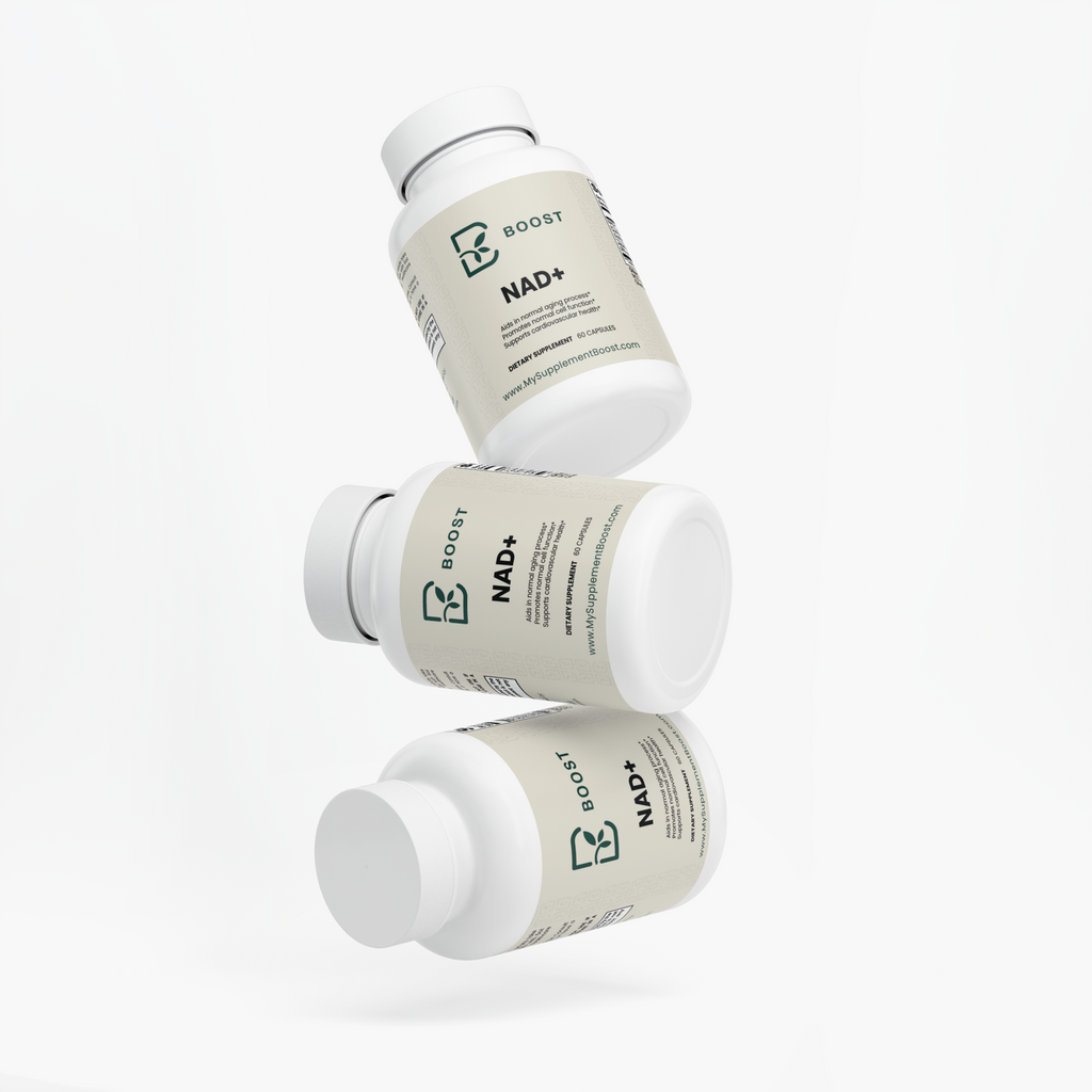 Several NAD+ bottles stacked at angles on a plain background