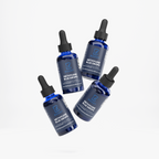 Several Methylene Blue Drops bottles stacked at angles on a plain background