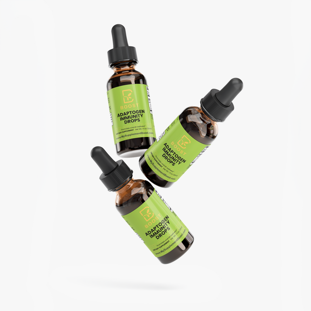 Several Adaptogen Immunity Drops bottles stacked at angles on a plain background